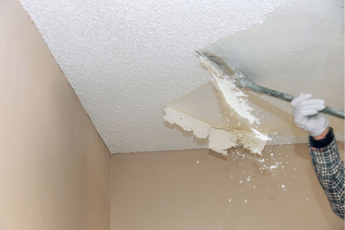 Popcorn ceiling removal in progress
